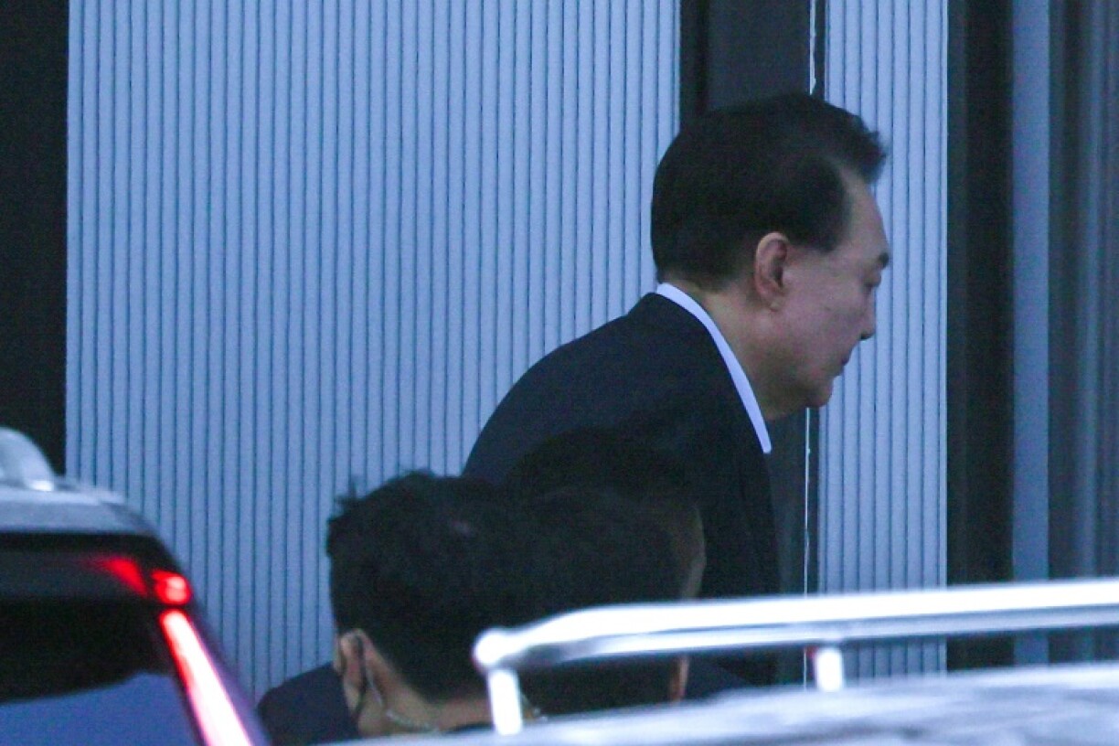 South Korea's impeached President Yoon Suk Yeol arrives at the complex building housing the Corruption Investigation Office for High-ranking Officials (CIO) in Seoul