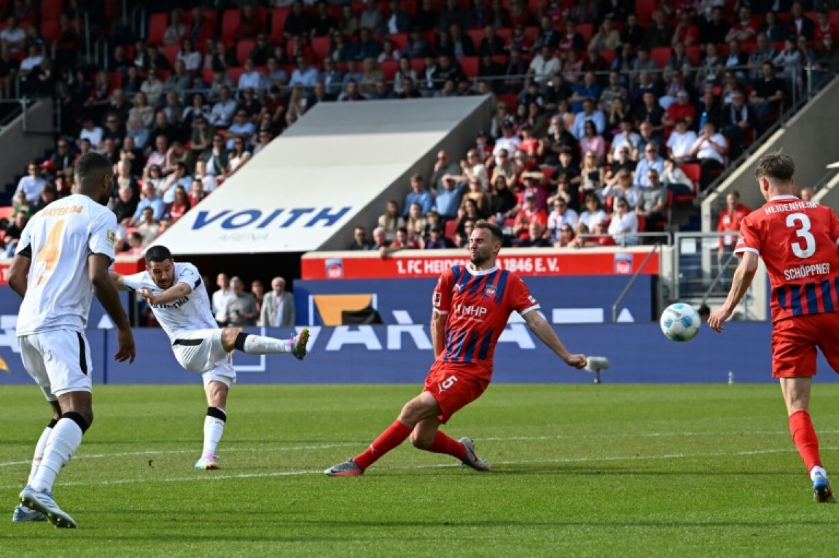 Emiliano Buendia (2nd L) scored a 91st-minute winner for Bayer Leverkusen at Heidenheim
