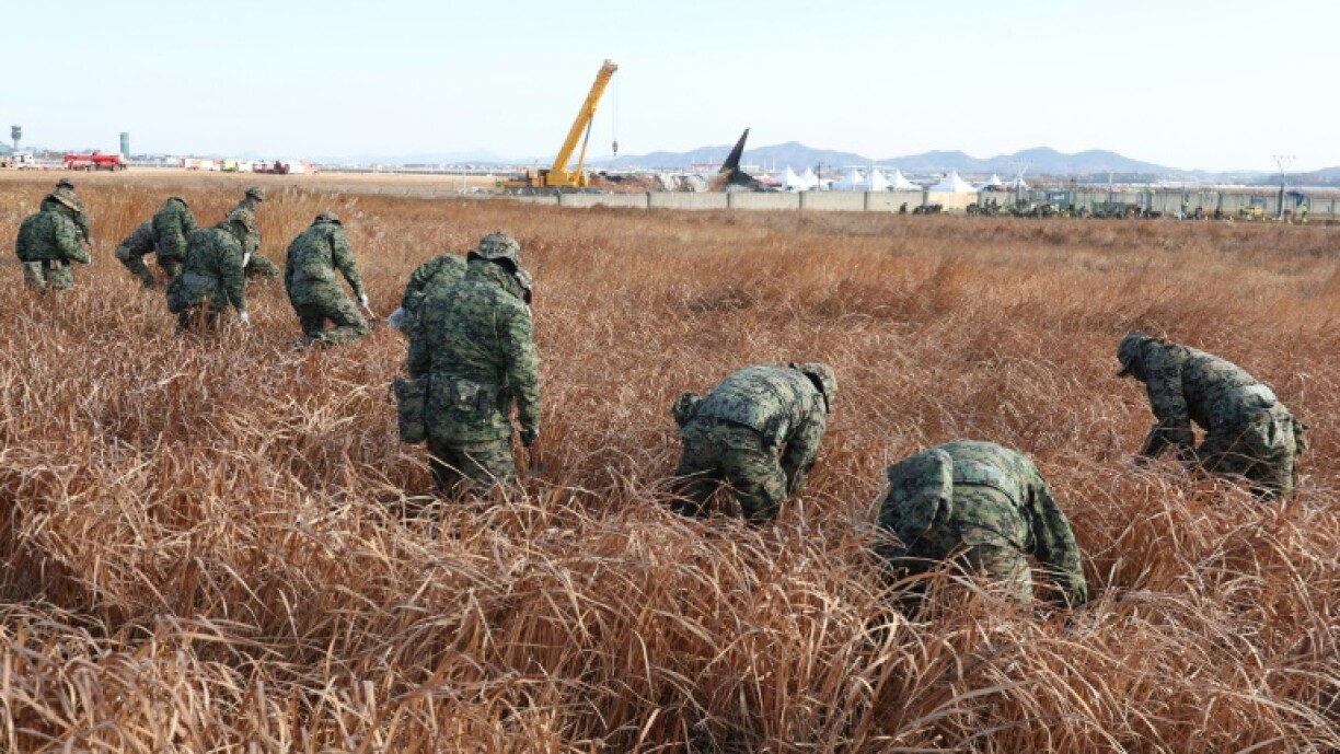 Soldiers have scoured the site of the Jeju Air passenger plane crash at Muan International Airport