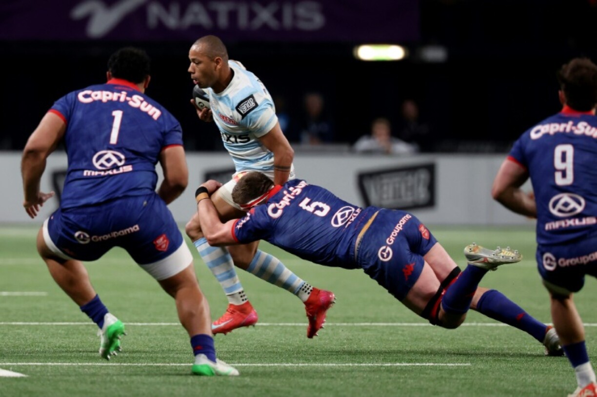 Gael Fickou (C-L) scored one of Racing 92's seven tries in their crushing victory over rivals Stade Francais