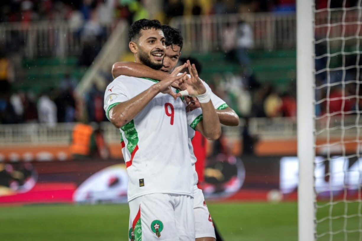 Morocco forward Oussama Lamlioui (C) celebrates after scoring during the African Nations Championship (CHAN) group stage match against Democratic Republic of Congo in Nairobi