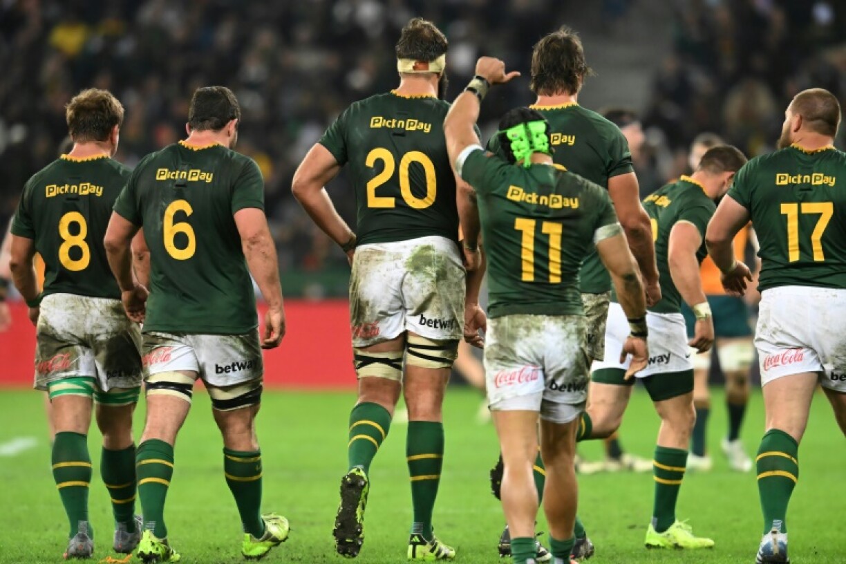 South Africa wing Cheslin Kolbe (3rd R) gives the thumbs up after the Boks beat Australia 30-22 in Cape Town