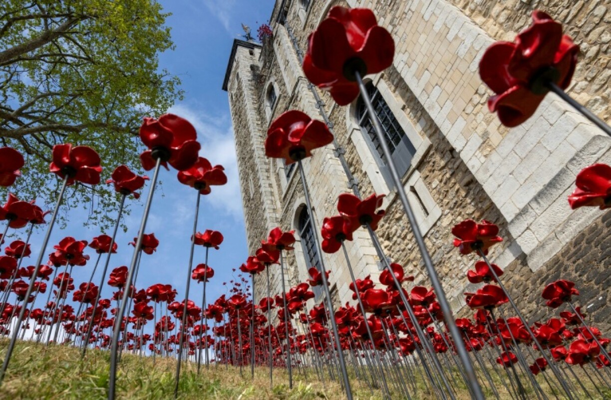 Designer Tom Piper and artist Paul Cummins use 30,000 ceramic poppies for the installation