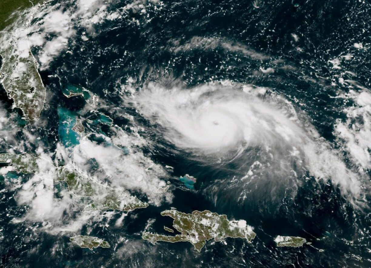A satellite image shows Hurricane Dorian approaching the Bahamas and Florida on August 30