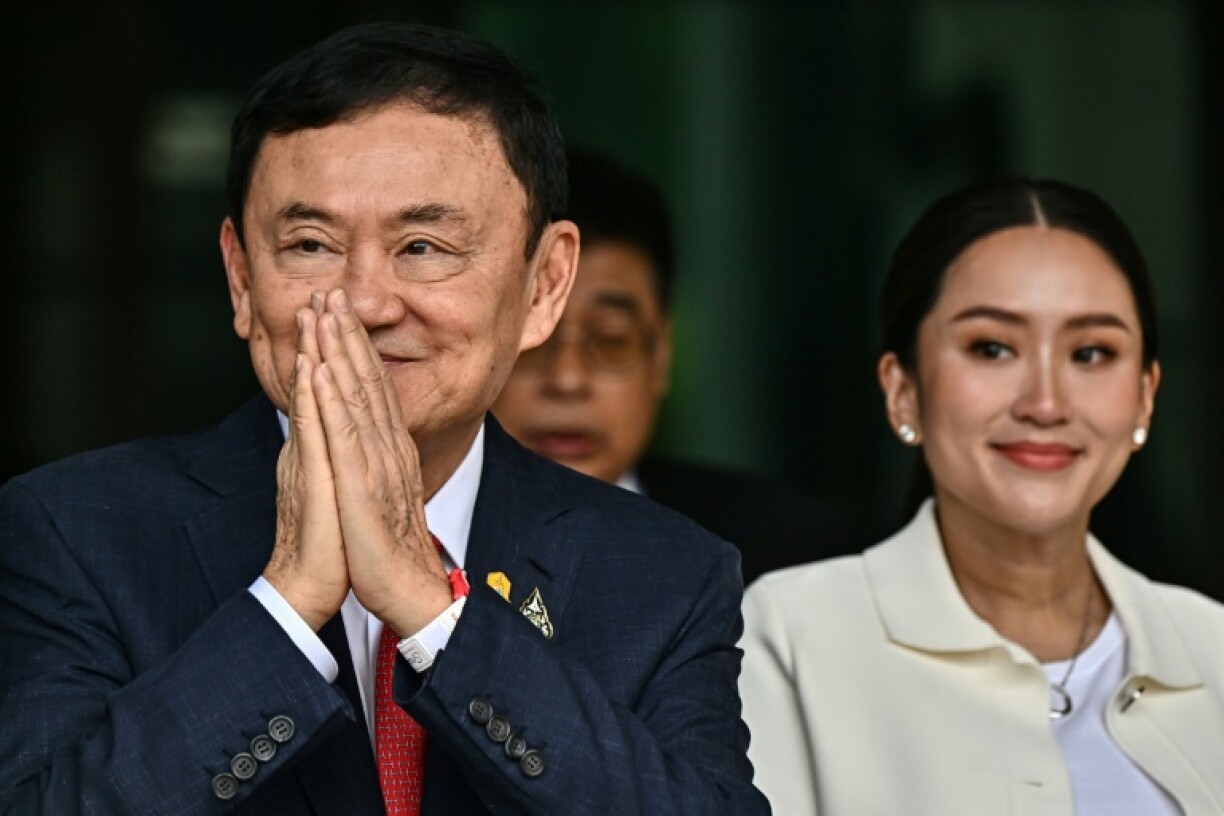 Paetongtarn's father, ousted former prime minister Thaksin Shinawatra, is facing a separate lawsuit accused of insulting the monarchy