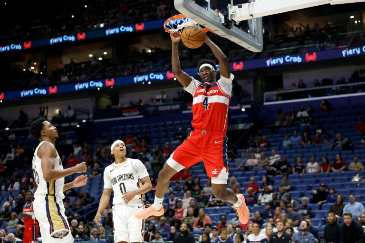 Washington teen rookie forward A.J. Dybantsa dunks during a pre-season game