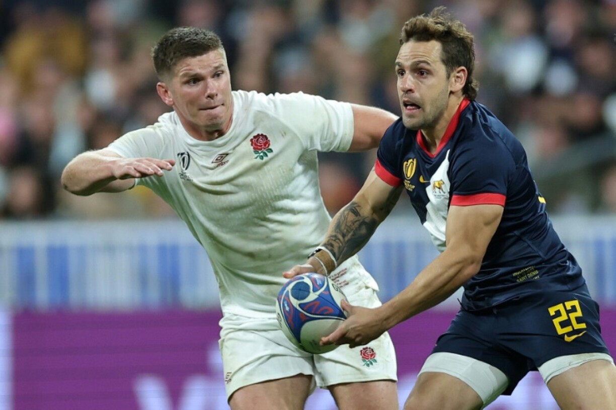 In his final Test Nicolas Sanchez (R) evades the attentions of England's Owen Farrell in the 2023 World Cup third-place match in Paris