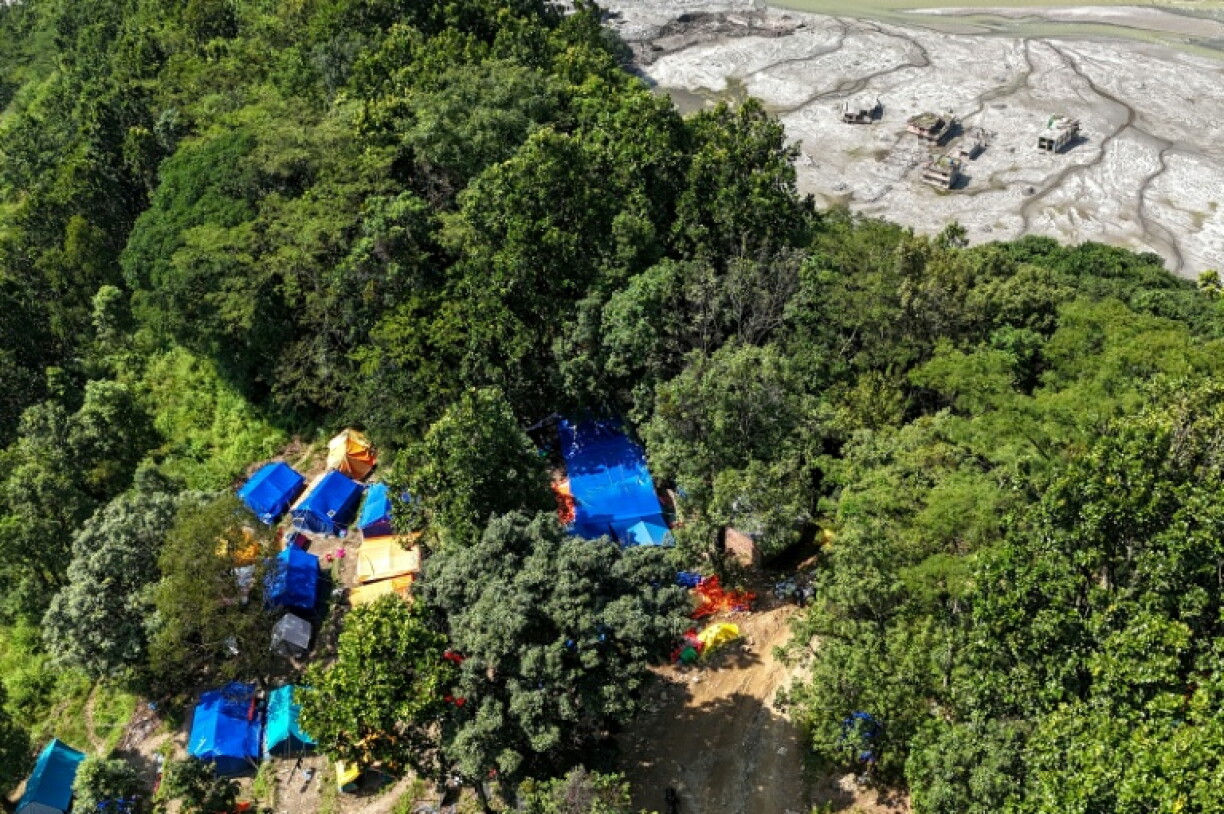 Hundreds of people in Nepal are living in tent shelters following a catastrophic Himalayan flood triggered by a mountain and glacier collapse near Nepal's border with China on August 26