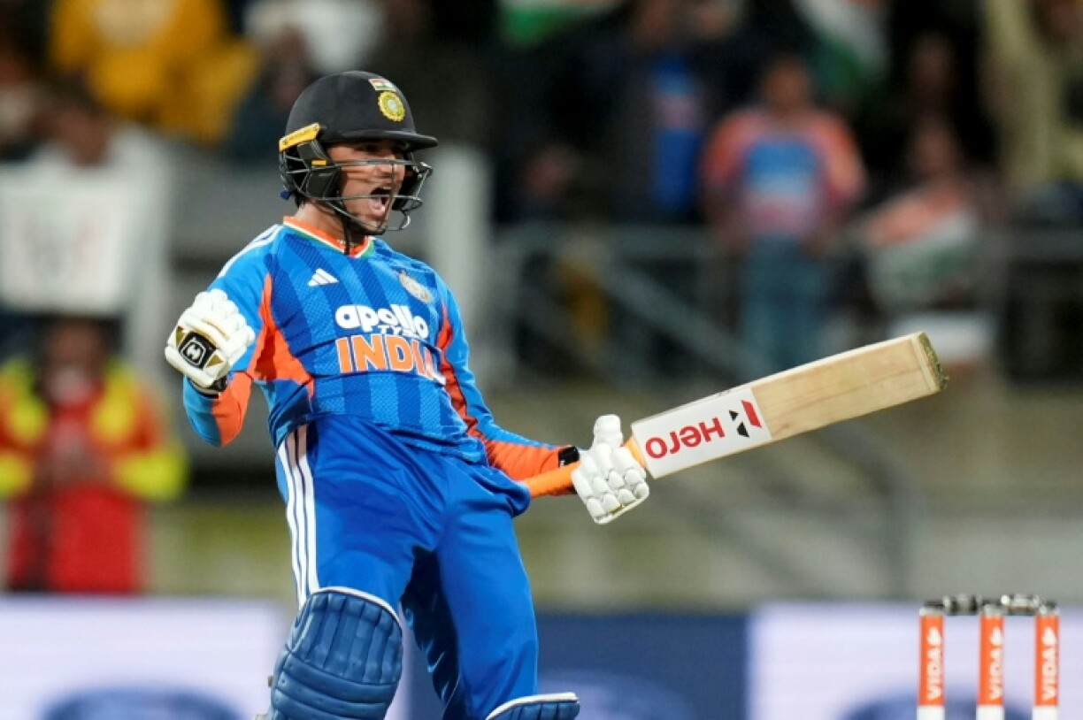 India's Abhishek Sharma celebrates 100 runs during the 3rd T20 cricket match between New Zealand and India at the HNRY Stadium in Wellington on October 27, 2026.