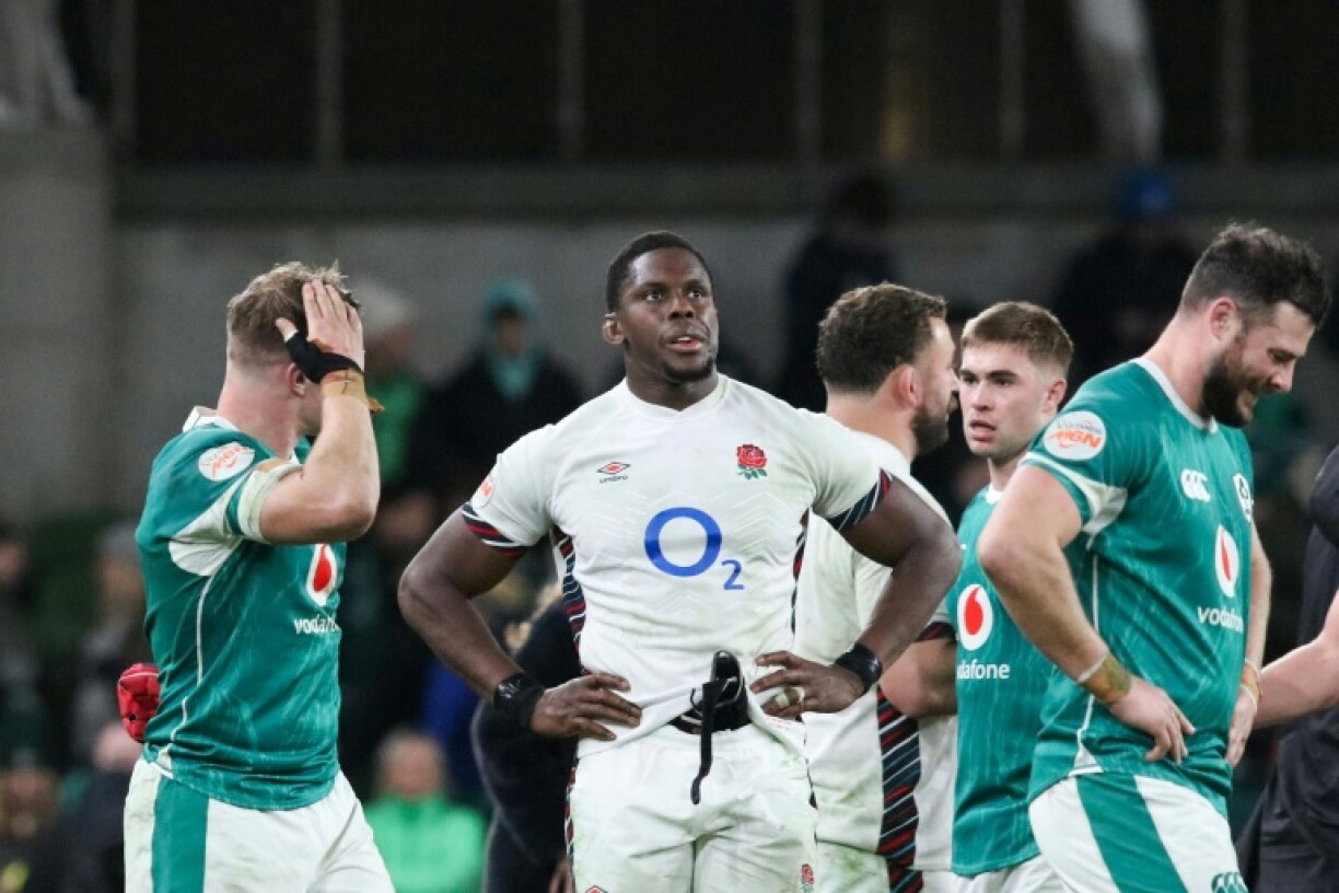 Beaten skipper: England captain Maro Itoje (C) reacts at full-time in Dublin