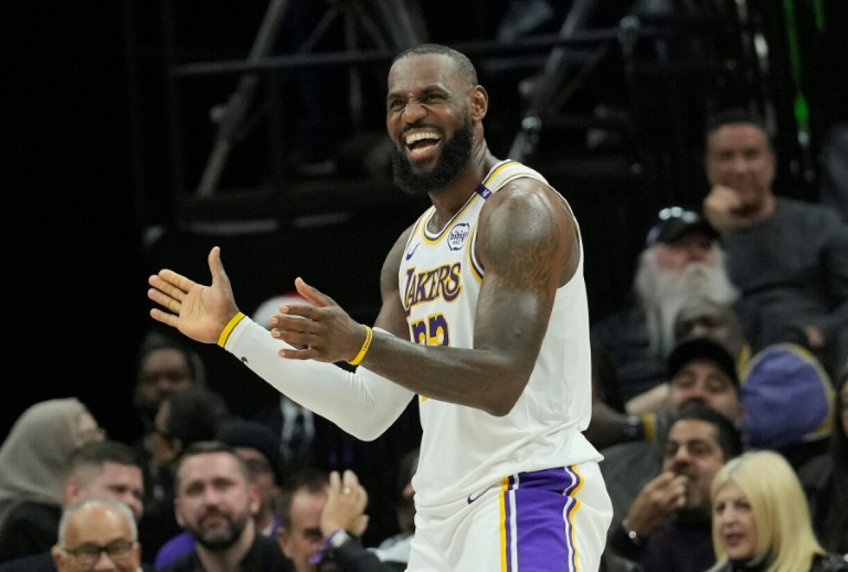 Los Angeles Lakers star LeBron James reacts to a basket during the Lakers' NBA victory over the Sacramento Kings