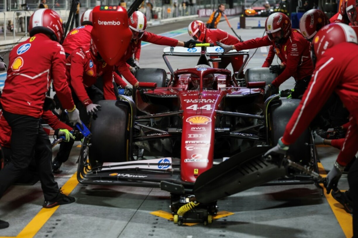 Ferrari's British driver Lewis Hamilton makes a pit stop during a disappointing qualifying session in Las Vegas