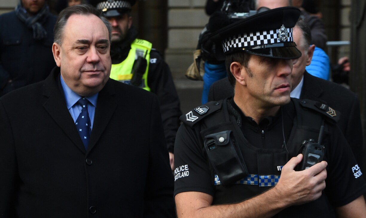 Former Scottish first minister and pro-independence figurehead Alex Salmond (L) leaves court in Edinburgh on January 24, 2019 after being charged in a probe over allegations of sexual harassment.
