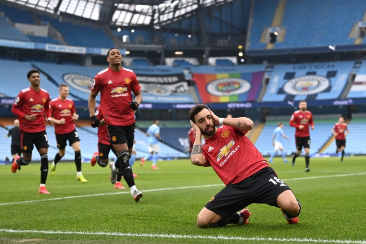 Le Portugais Bruno Fernandes buteur sur penalty a lancé Manchester United sur la voie du succès contre son rival Manchester City à l'Etihad Stadium, le 7 mars 2021