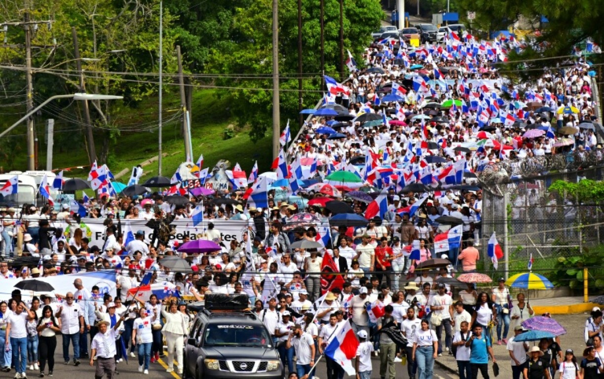 Thousands of government critics demonstrated in Panama City to protest a deal allowing the US military to deploy to bases around the Panama Canal, among other government policies
