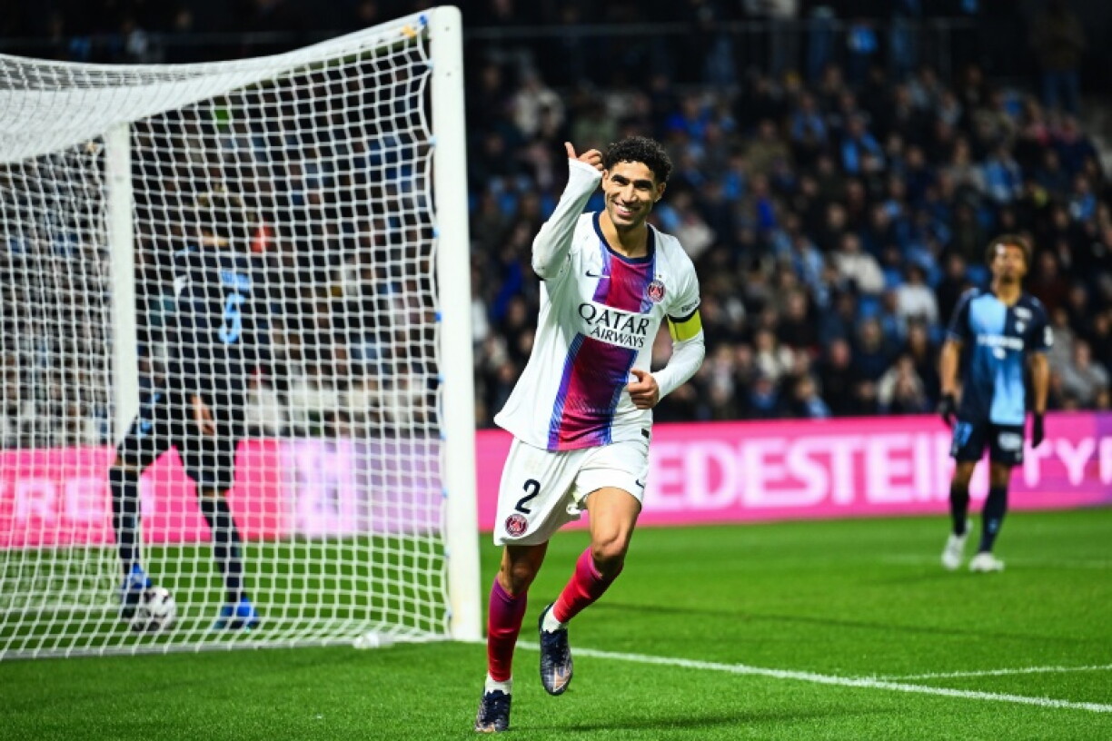 Achraf Hakimi celebrates his hat-trick