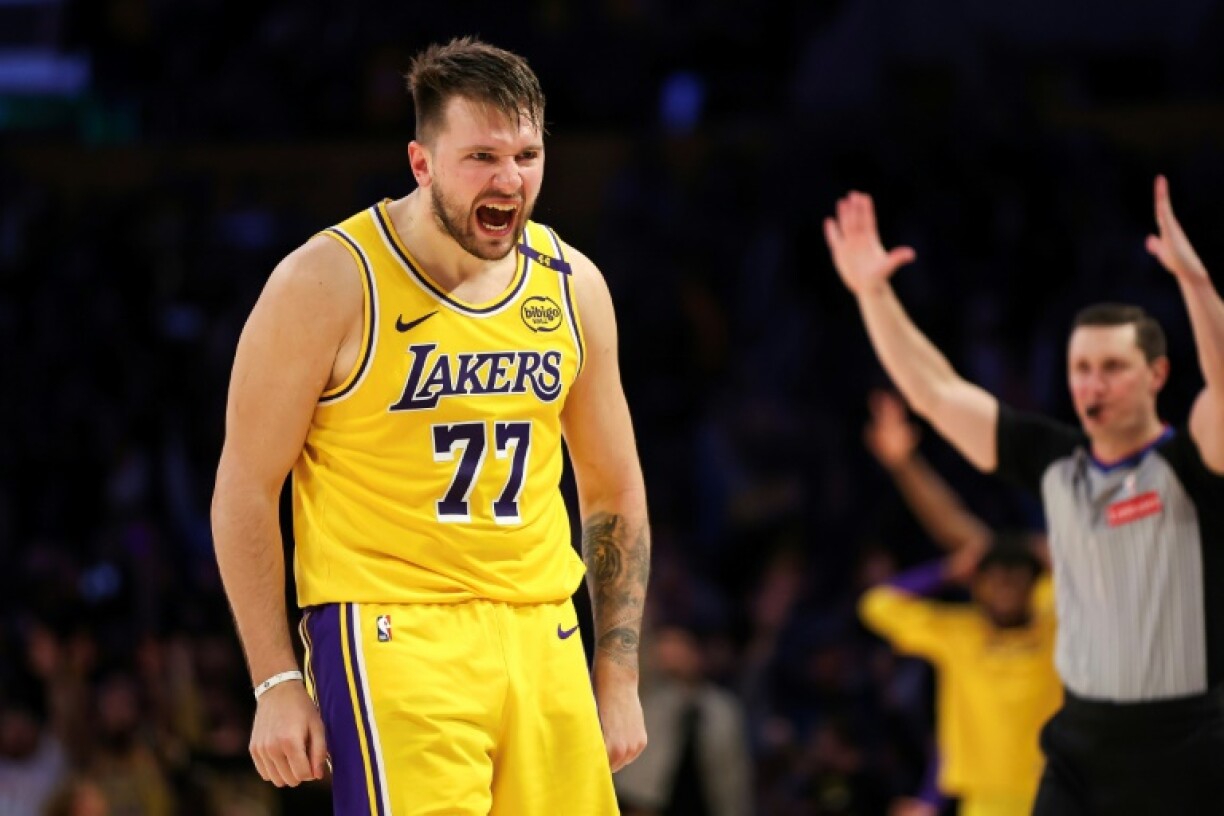 Luka Doncic reacts after making a three-pointer in the Los Angeles Lakers thrilling overtime win over the New York Knicks