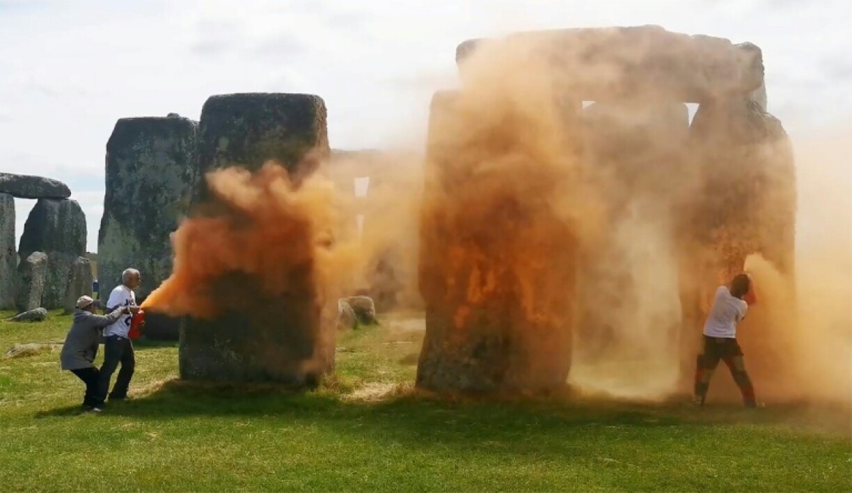 Two activists are accused of throwing orange paint powder at Stonehenge