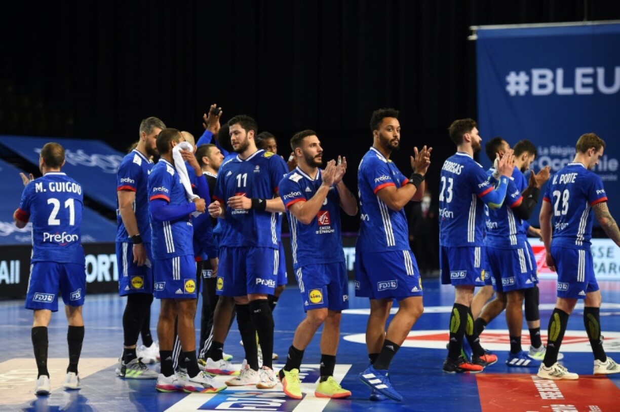 Les Français heureux après leur victoire sur la Tunisie en match qualificatif pour les Jeux olympique de Tokyo, à Pérols, le 13 mars 2021