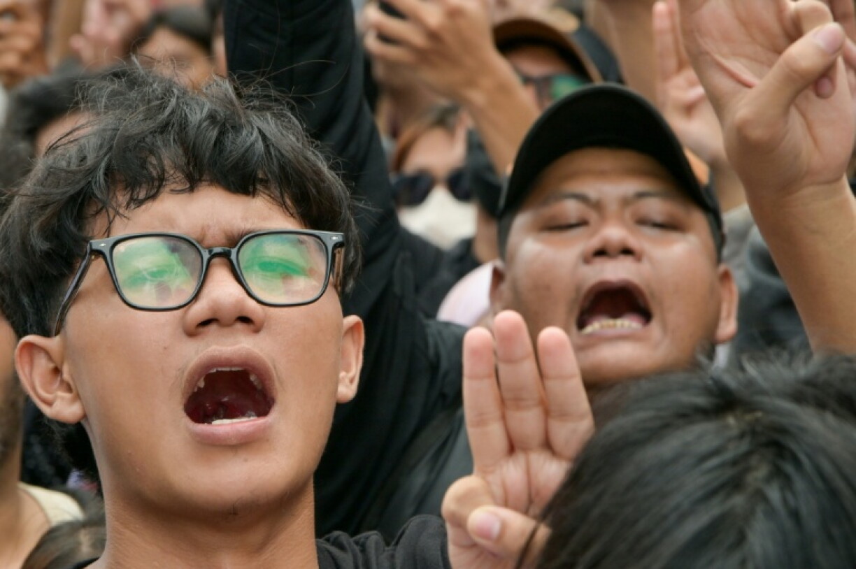 Many demonstrators held up the three-finger salute of rebellion from dystopian franchise 'The Hunger Games'
