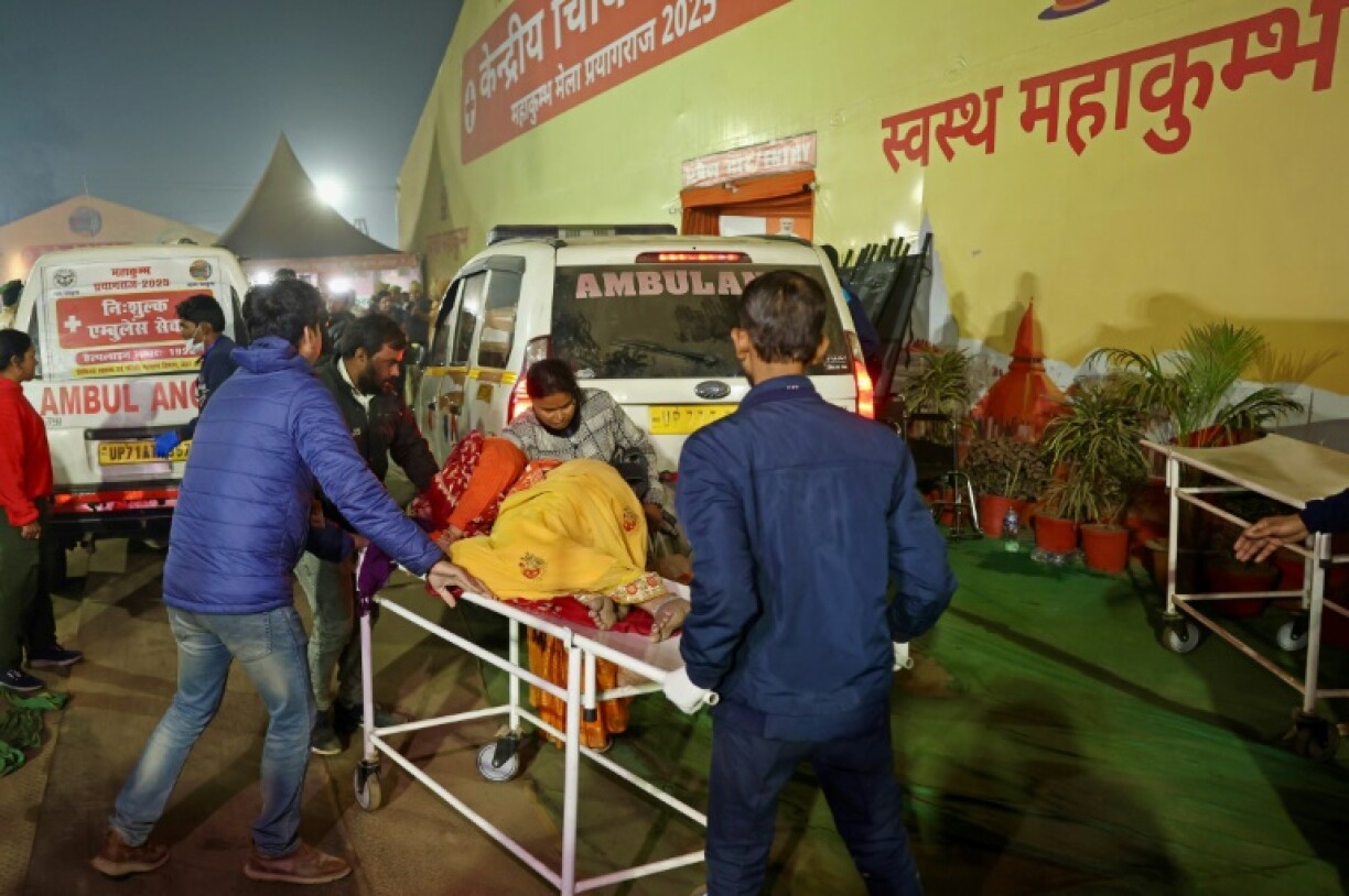 An injured pilgrim is taken to a hospital after a stampede during the Kumbh Mela festival in Prayagraj, India