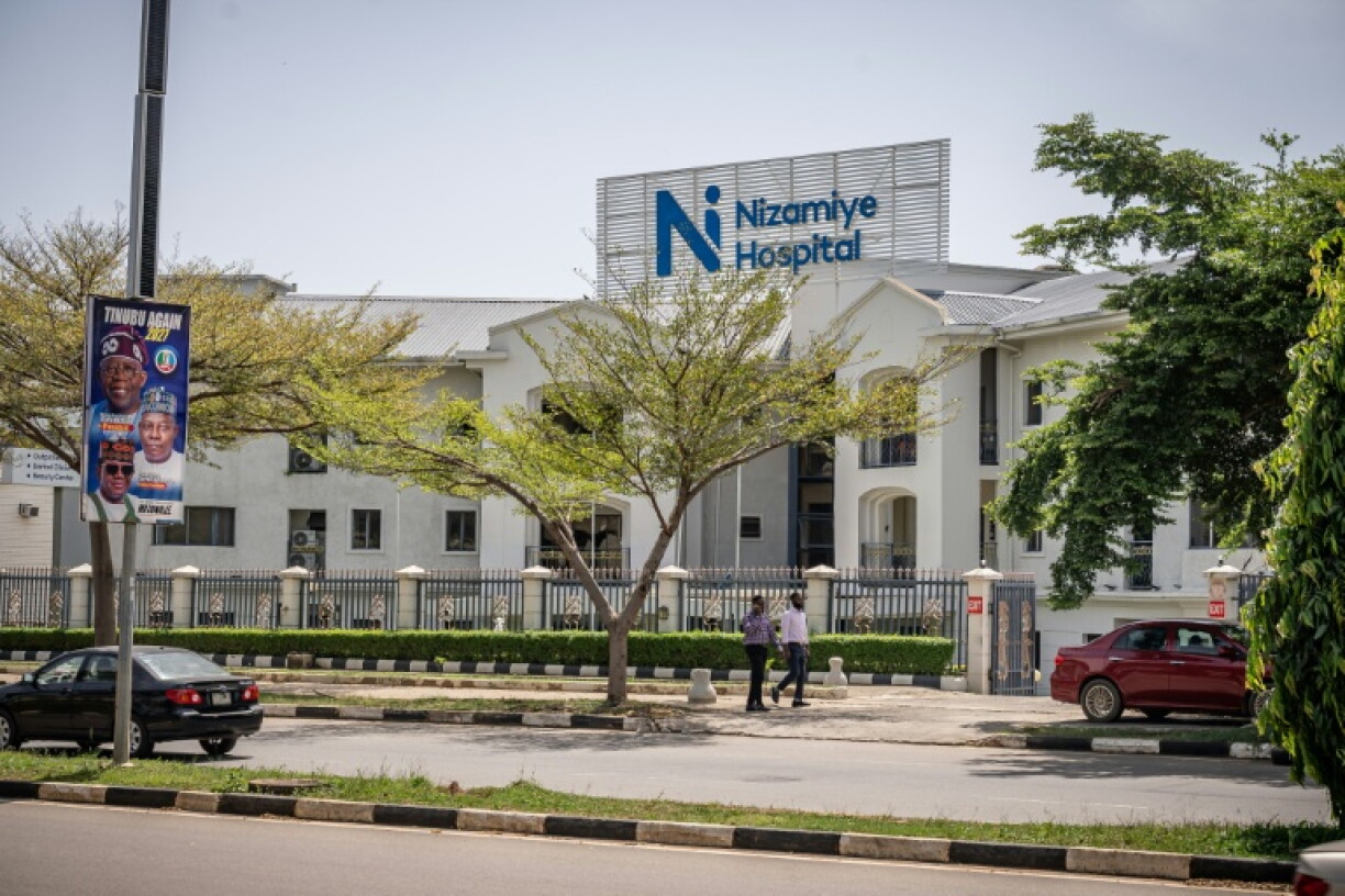 Health care workers in the Nigerian capital are treating a woman for Ebola after she travelled to Uganda