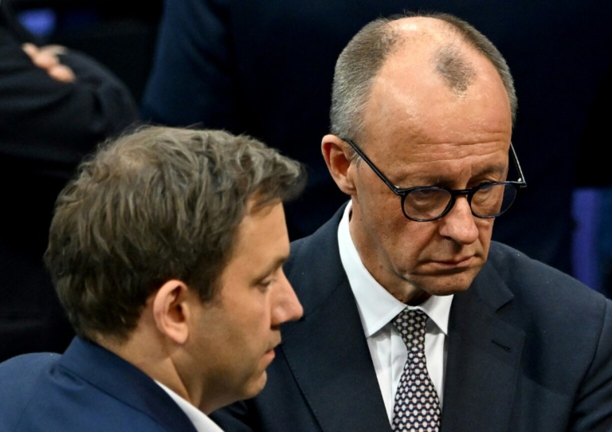 Merz (R) urged Xi (not pictured) to support European efforts towards a ceasefire in Ukraine, his office said