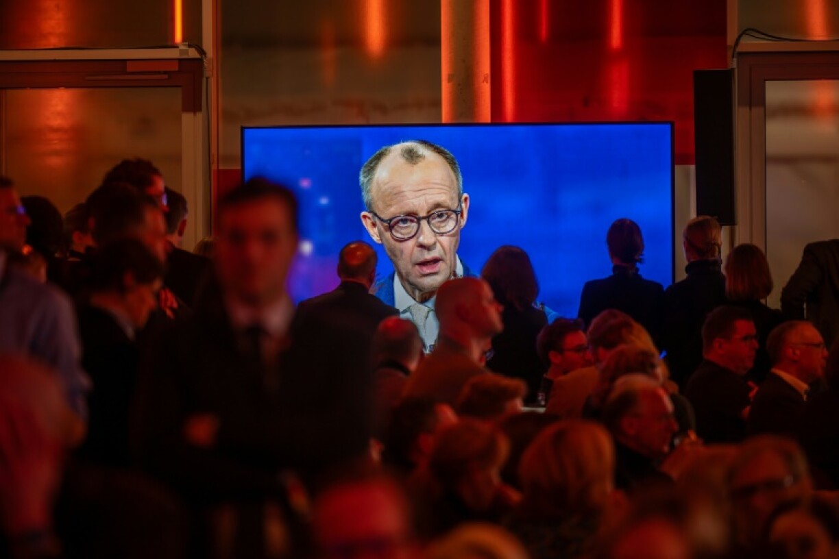 Friedrich Merz is seen on a screen during the TV debate in Berlin ahead of elections on February 23