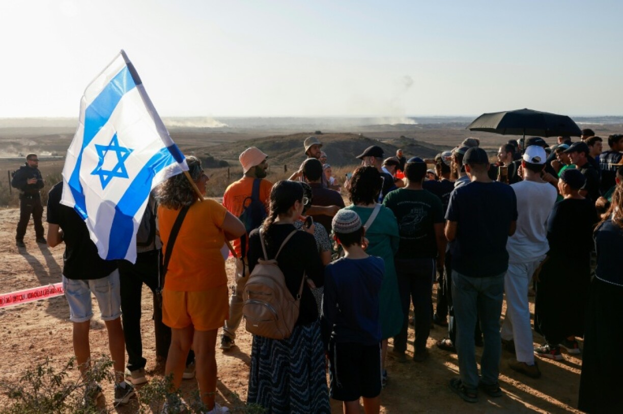 Israeli settlement activists gather on a hill overlooking war-devastated Gaza to stake their claim to the battered territory.