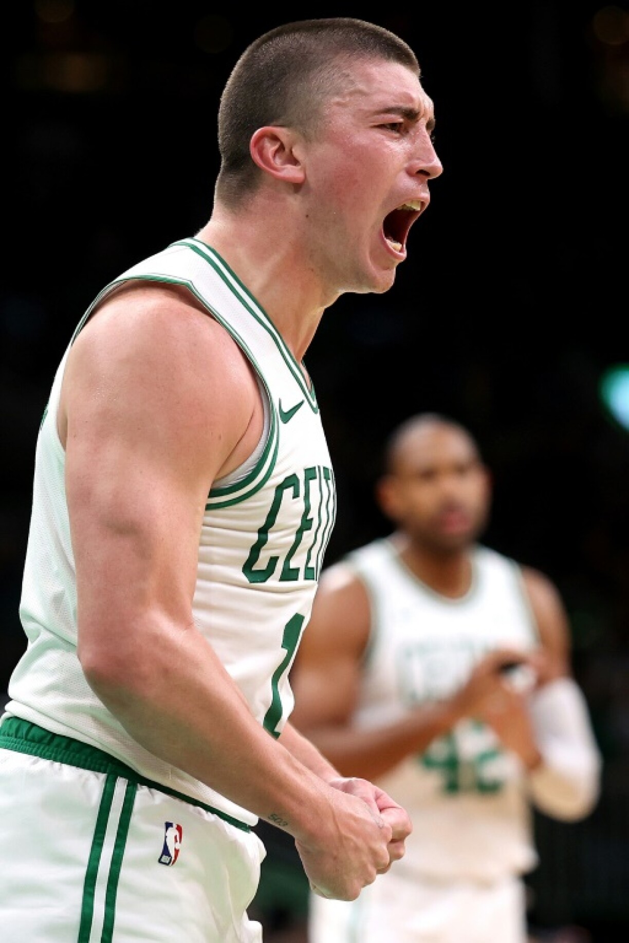 Boston's Payton Pritchard celebrates on his way to 43 points in the Celtics victory over Portland