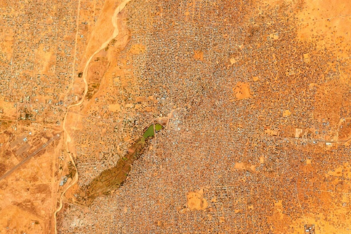 A satellite photograph from Planet Labs PBC shows a wide view of El-Fasher