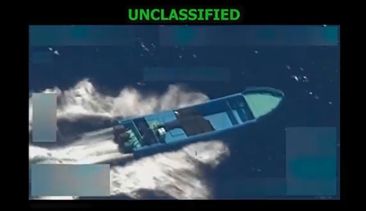 This image from a video released by US Defense Secretary Pete Hegseth appears to show an alleged drug-smuggling boat in the Eastern Pacific Ocean moments before a US military strike destroys it