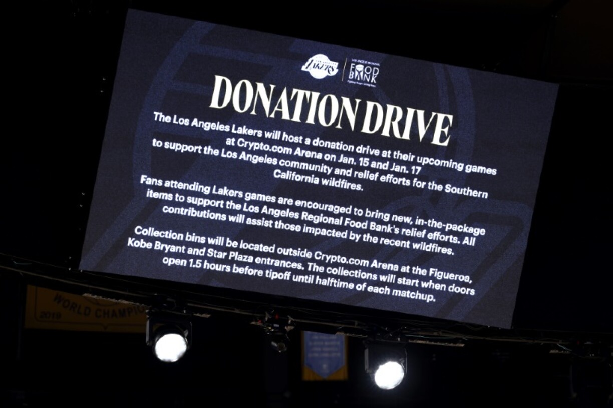 Signs report on a donation drive held by the Los Angeles Lakers to support the wildfire relief effort