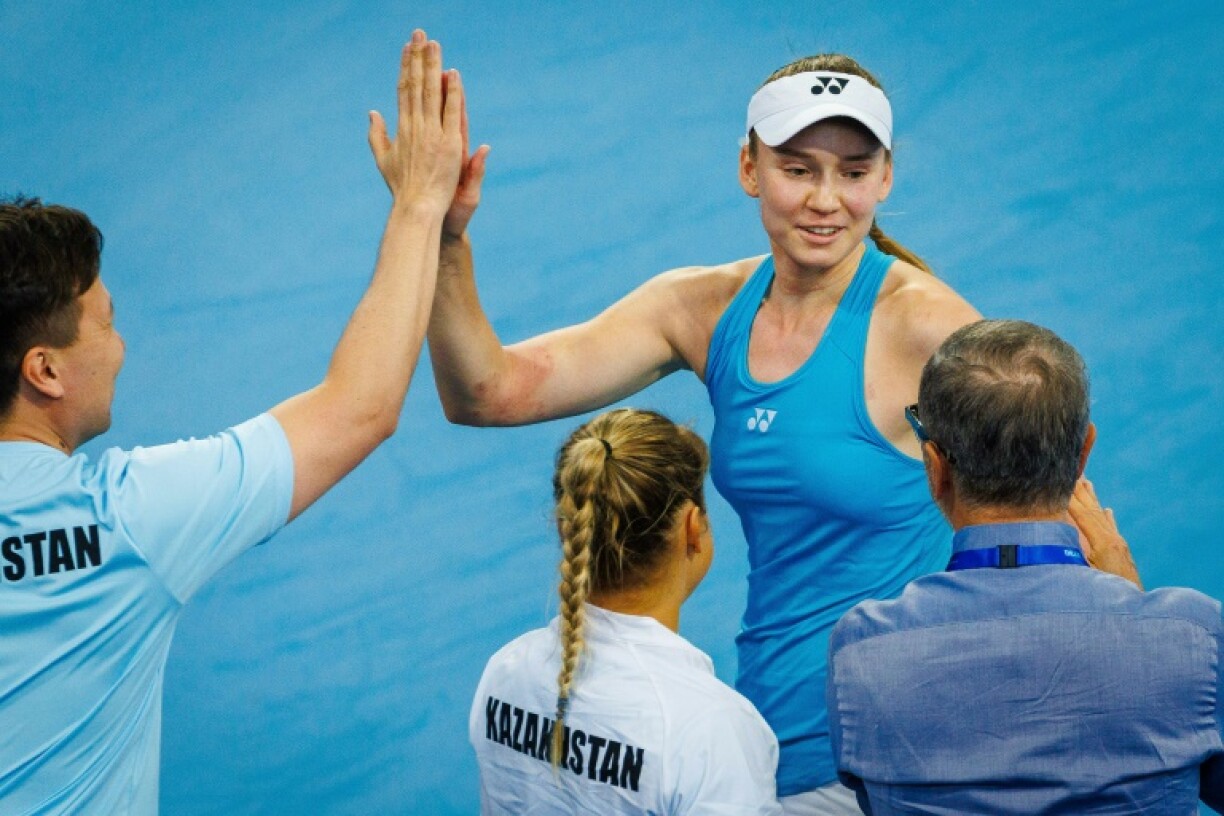 Kazakhstan's Elena Rybakina celebrates with her team after reaching the Billie Jean King Cup finals