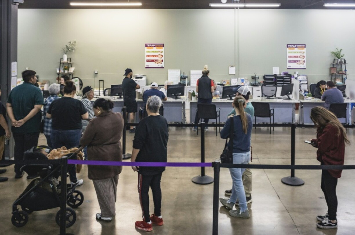 People in line at a Tucson food bank, an increasingly frequented resource following Republican cuts to food assistance
