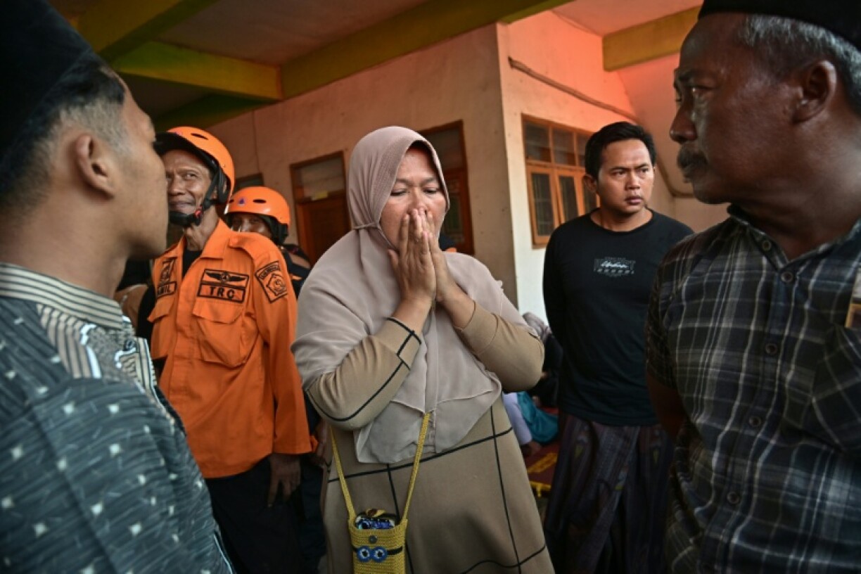 Desperate parents are waiting for news of their children trapped in a school collapse in Indonesia