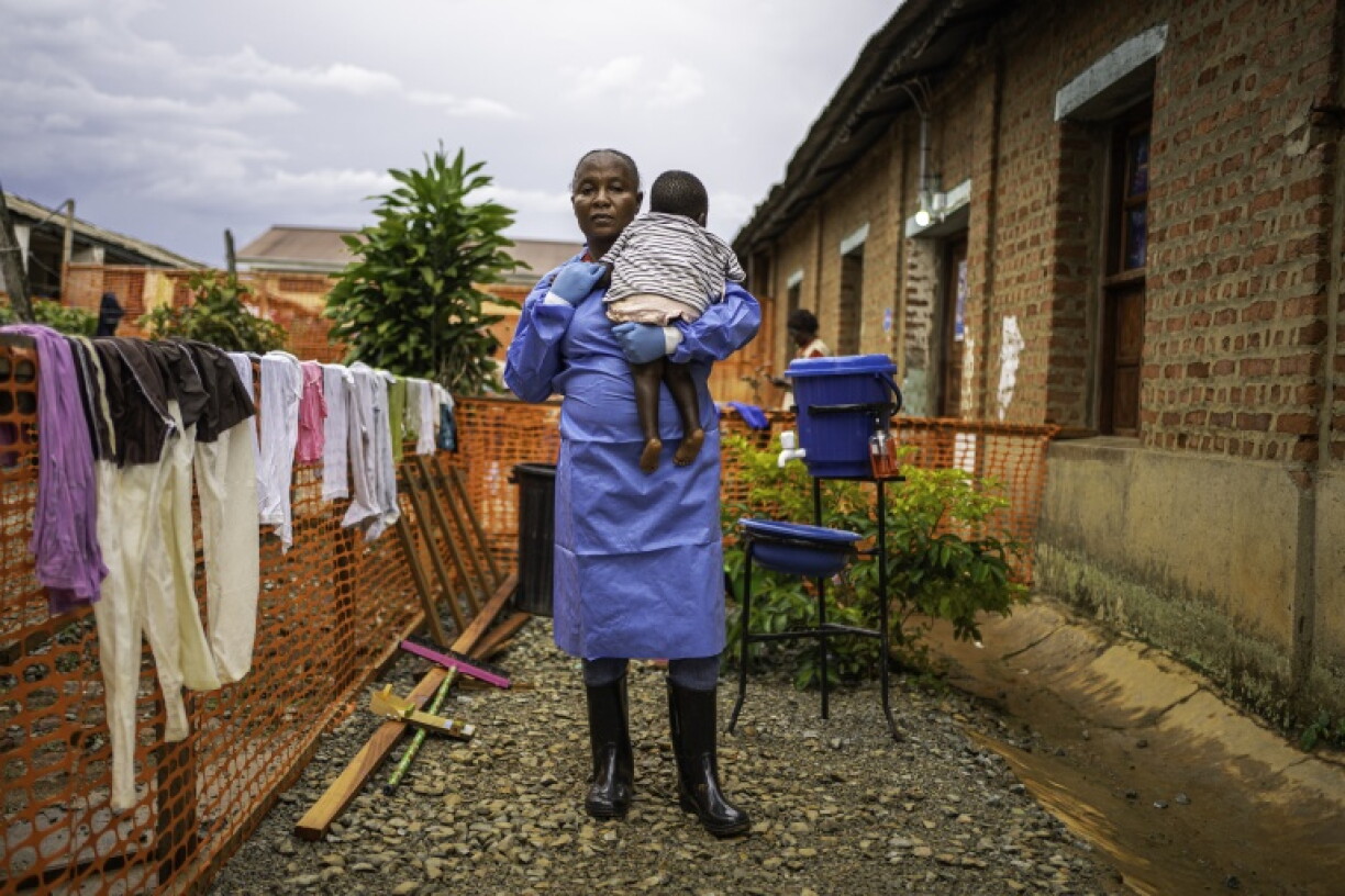 Caregiver Marie Bakikula looks after orphans of the DR Congo's Ebola crisis