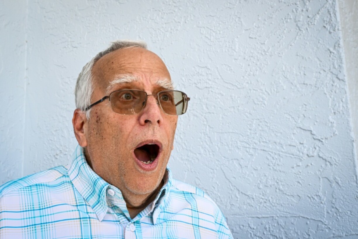 Louis Prevost reenacts his reaction to seeing his brother named the new pope, Leo XIV