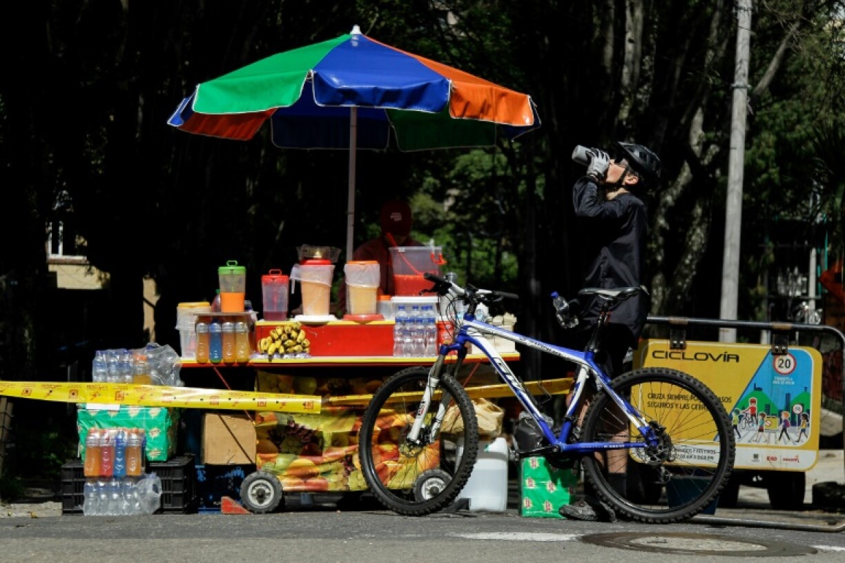 The mood is festive at the Ciclovia, with stalls dotted along the route offering juices, arepas (corn cakes) and other snacks