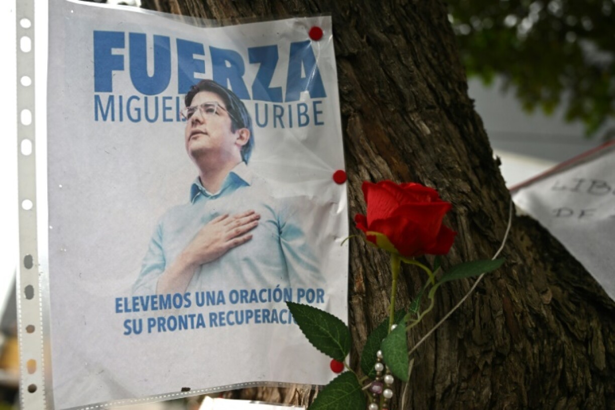 A poster is displayed during a mass for the health of Colombian senator Miguel Uribe, who was shot in Bogota in early June