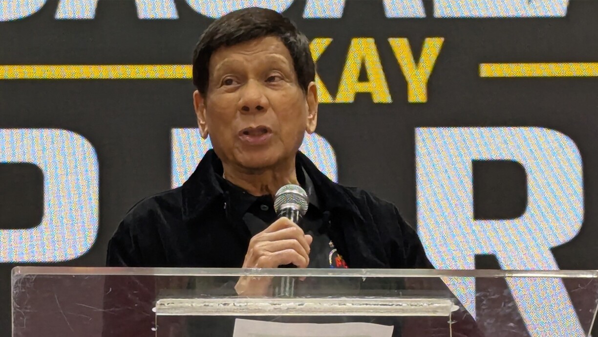 Former philippine president Rodrigo Duterte speaks during a gathering with the Philippine community in Hong Kong at the city's Southorn Stadium on 9 March, two days ahead of his arrest in Manila.