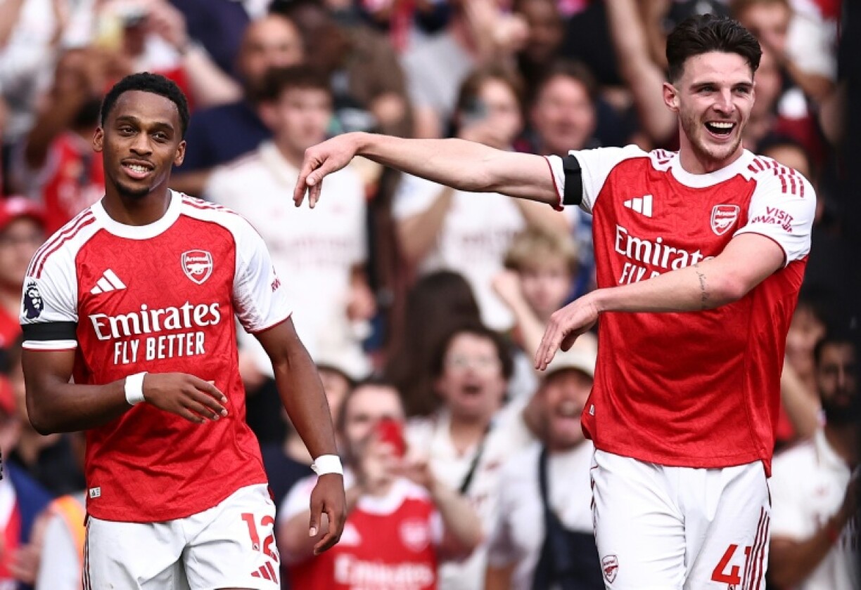 Jurrien Timber (left) scored twice as Arsenal thrashed Leeds