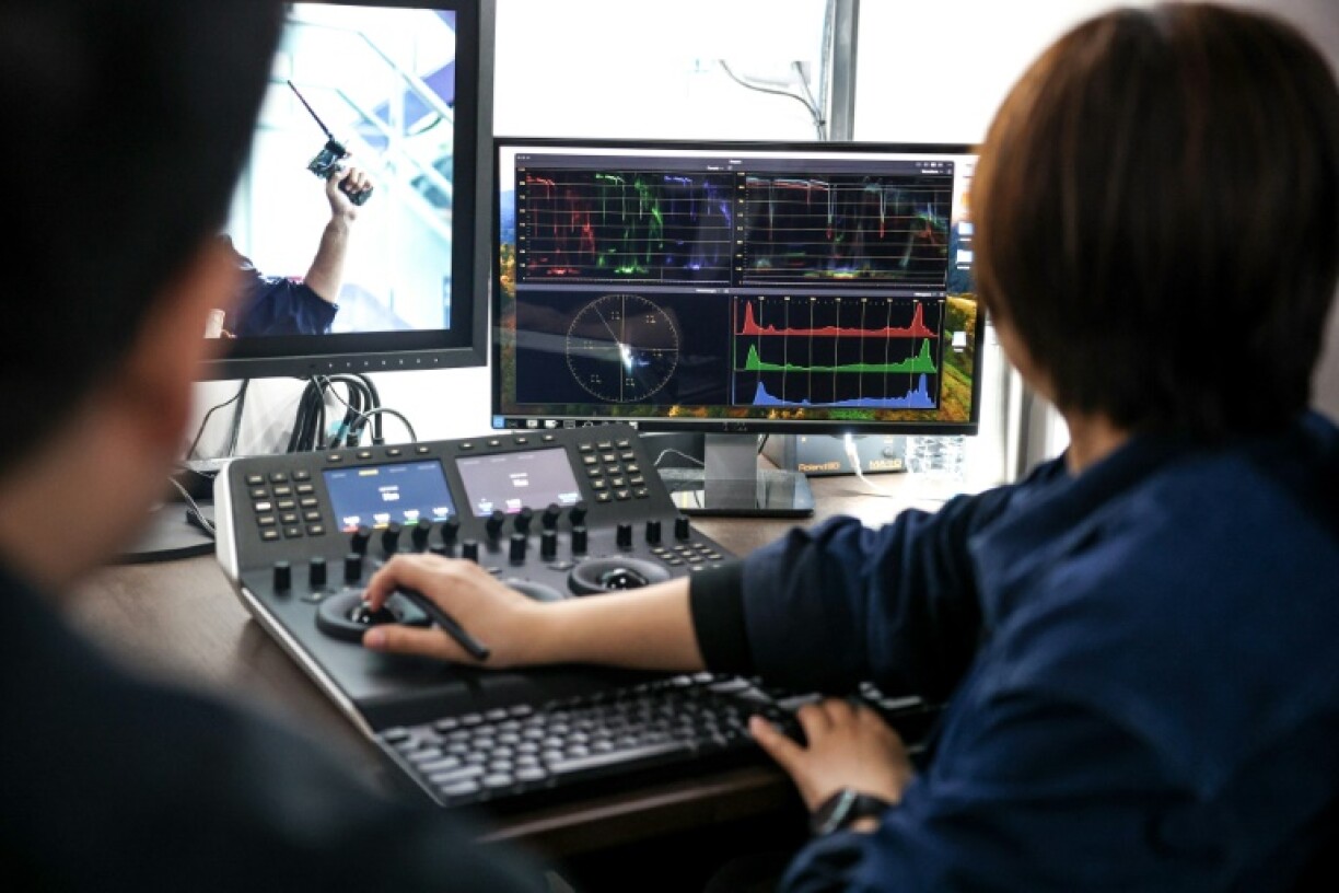 Colorist Liang Yu Fang works on post-production of the Taiwanese television series