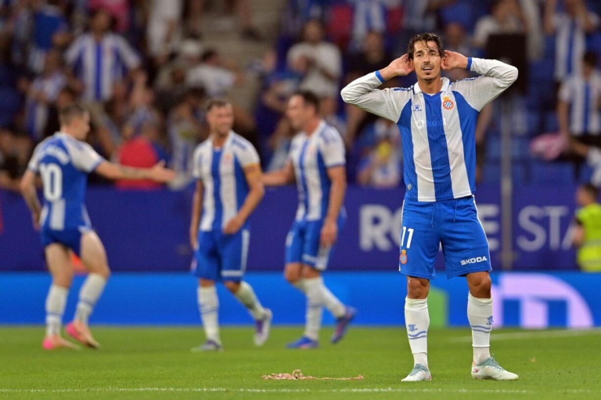 Pere Milla snatched Espanyol a dramatic win over Atletico Madrid