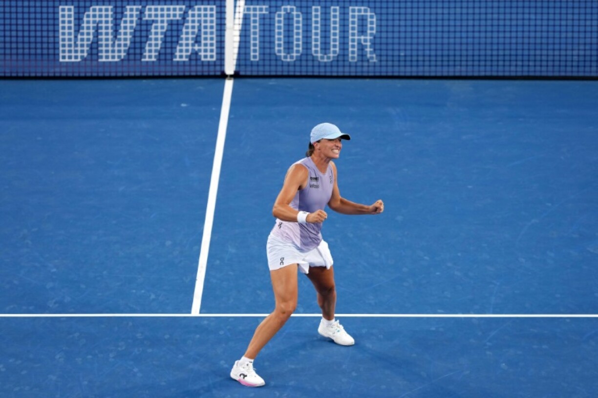 Iga Swiatek celebrates after defeating Jasmine Paolini to win the Cincinnati Open