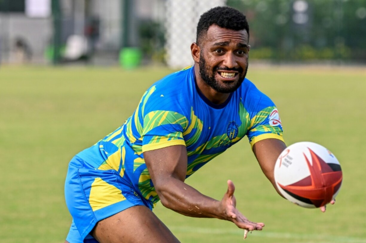 Joji Nasova scored two tries to spark Fiji over Japan 33-27 in the final of the Pacific Nations Cup men's rugby tournament