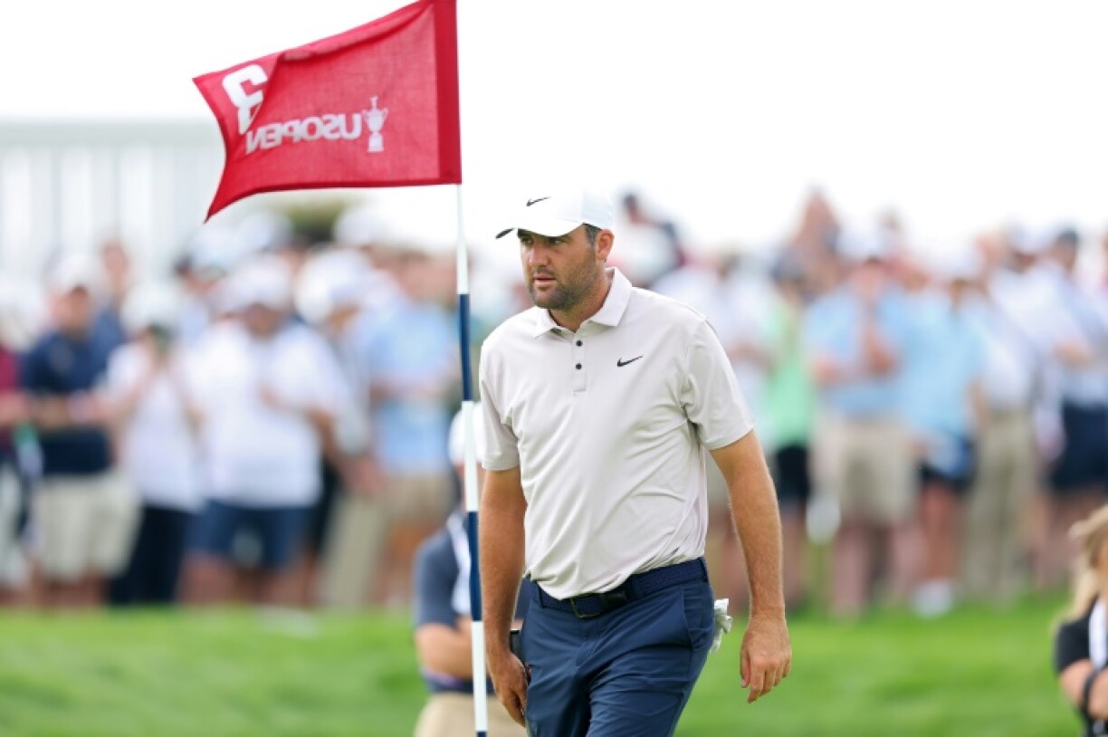 World number one Scottie Scheffler of the United States walks across the third green during a practice round at Oakmont ahead of the 125th US Open