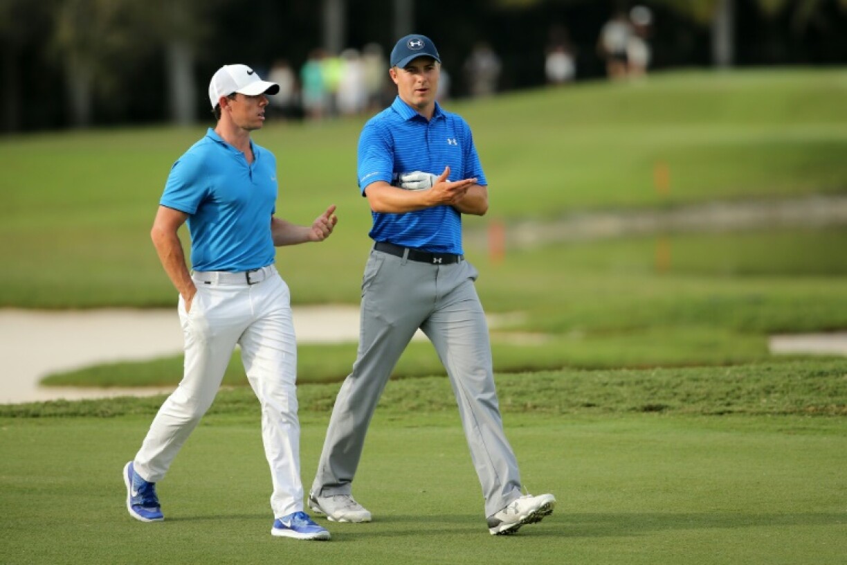 American Jordan Spieth, right, seeks a PGA Championship victory to complete a career Grand Slam and takes inspiration from Northern Ireland's Rory McIlroy, left, winning the Masters to complete his own career Slam