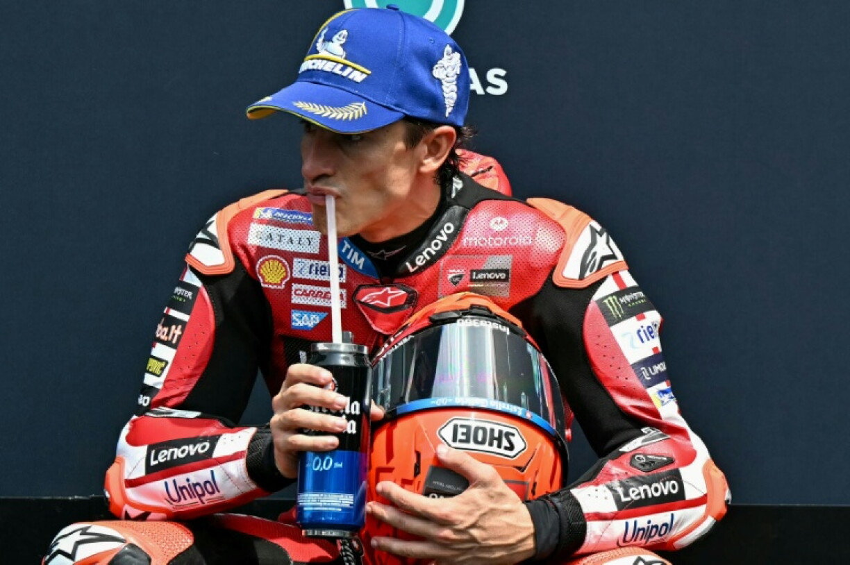Spanish MotoGP rider Marc Marquez reacts after coming second place in the qualifying session