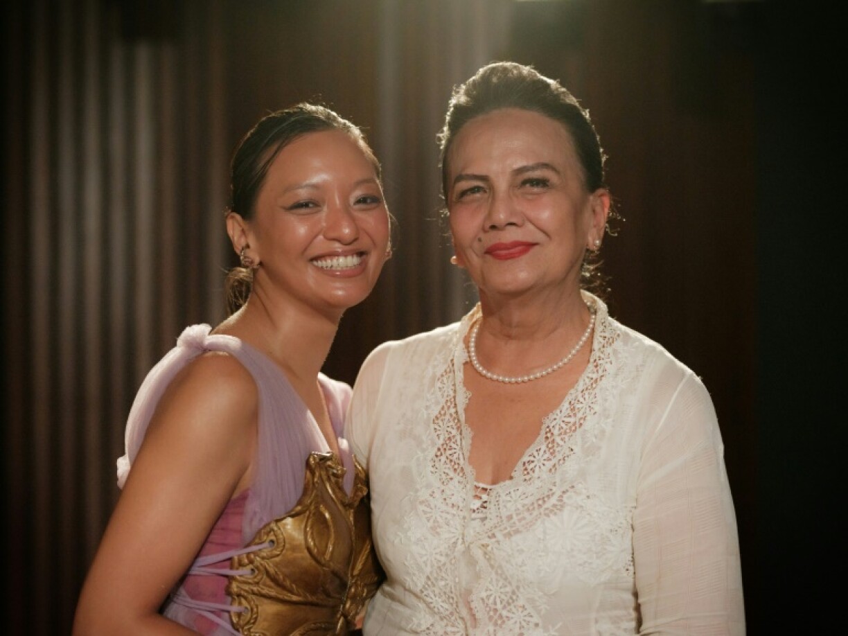 Indonesian actress and producer Christine Hakim (R) and actress Asmara Abigail